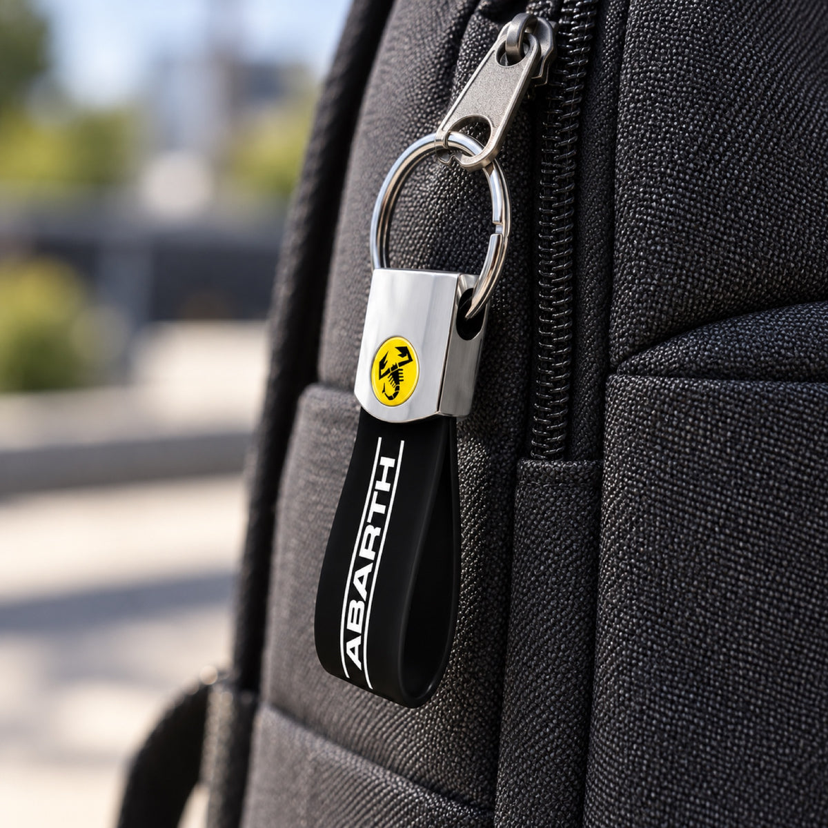 Abarth BAND Keyring – Black with Scorpion Logo – illustrative photo (AI)
