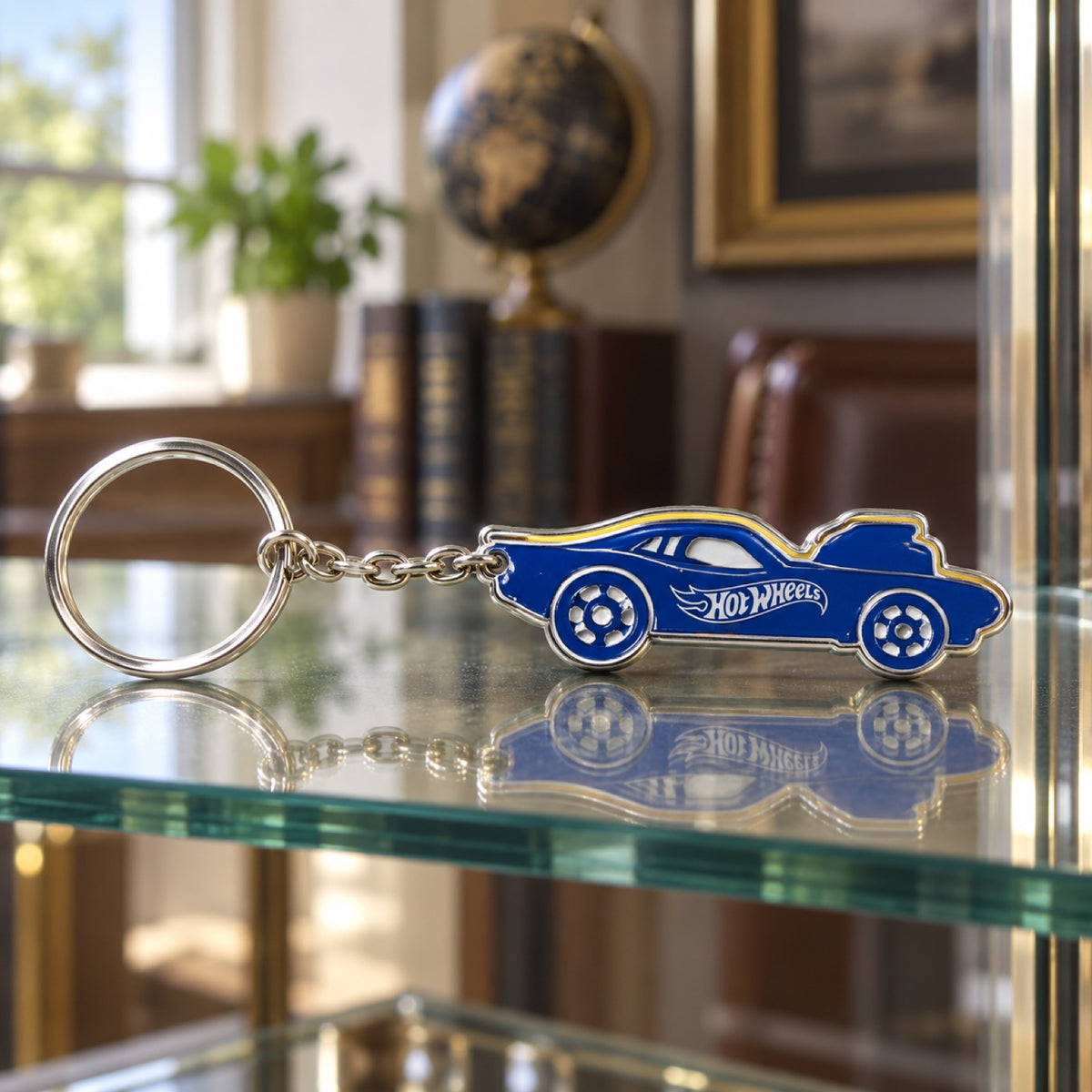 Breloc metalic Hot Wheels în formă de mașinuță cu logo – fotografie ilustrativă (AI)