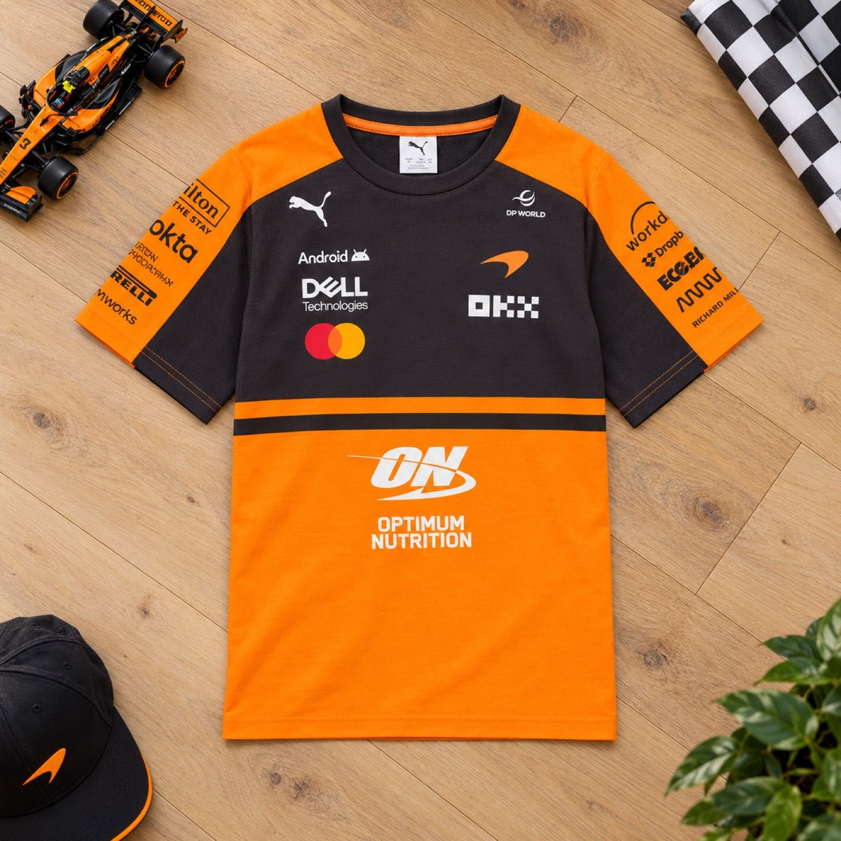 McLaren F1 x Puma Kids' Team T-Shirt with Sponsor Logos – Team Edition – ilustrační foto (AI)