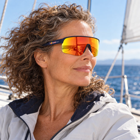 Ochelari de soare Red Bull Spect DAKOTA – albaștri cu lentile portocalii – fotografie ilustrativă (AI)